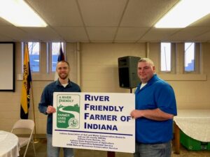 L) Vice Chair Jarrod Kunkel presents the award to Kevin Cassiday - 2020 Wells County River Friendly Farmer!